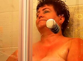 Horny mature BBW acquiring seduced round the shower